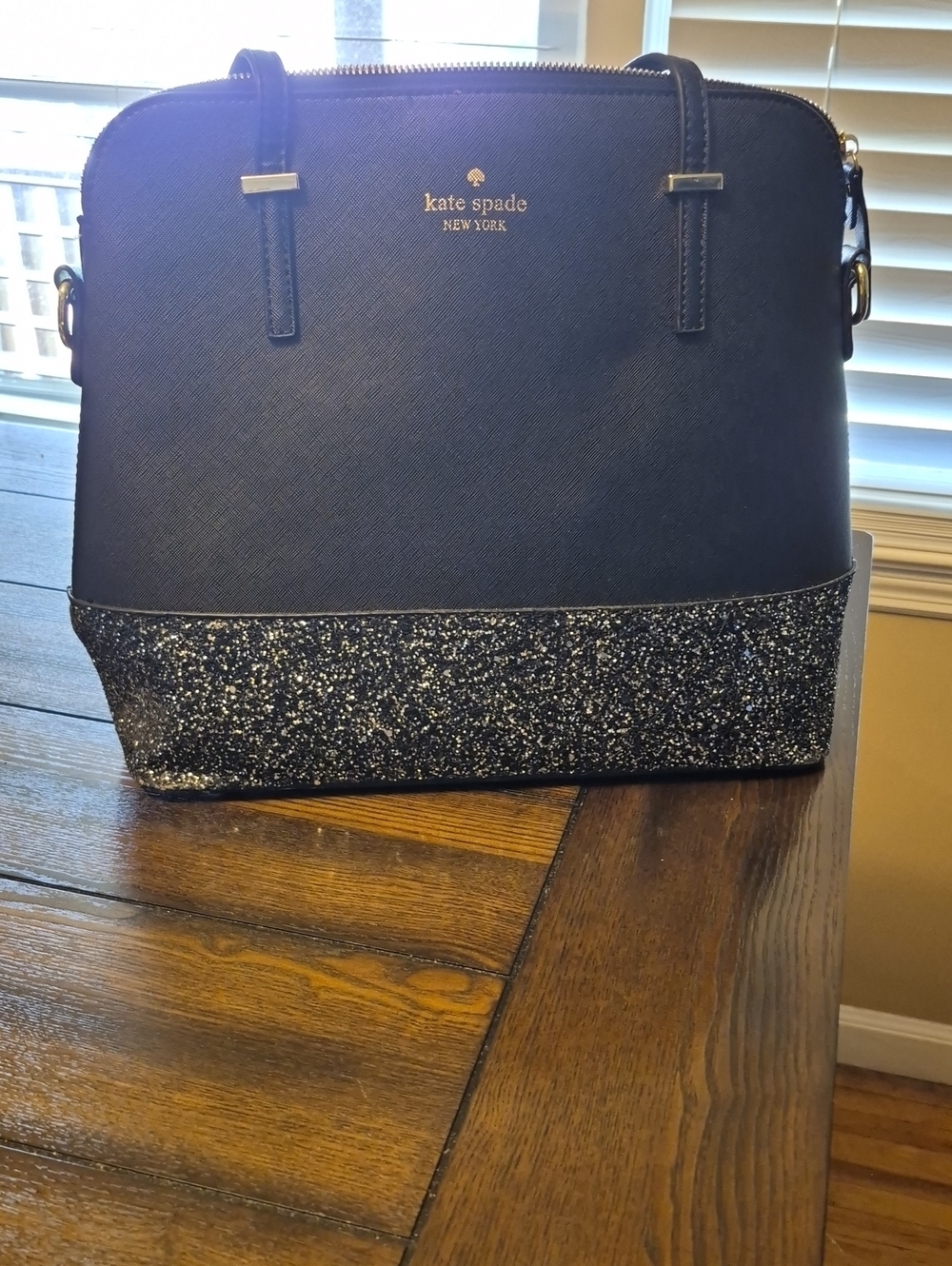 kate spade black satchel with silver glitter base